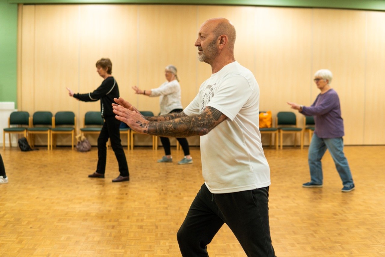 A group practising tai chi together