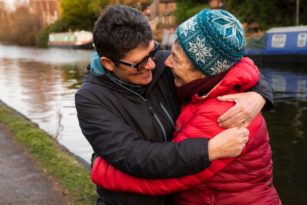 Two family members embracing