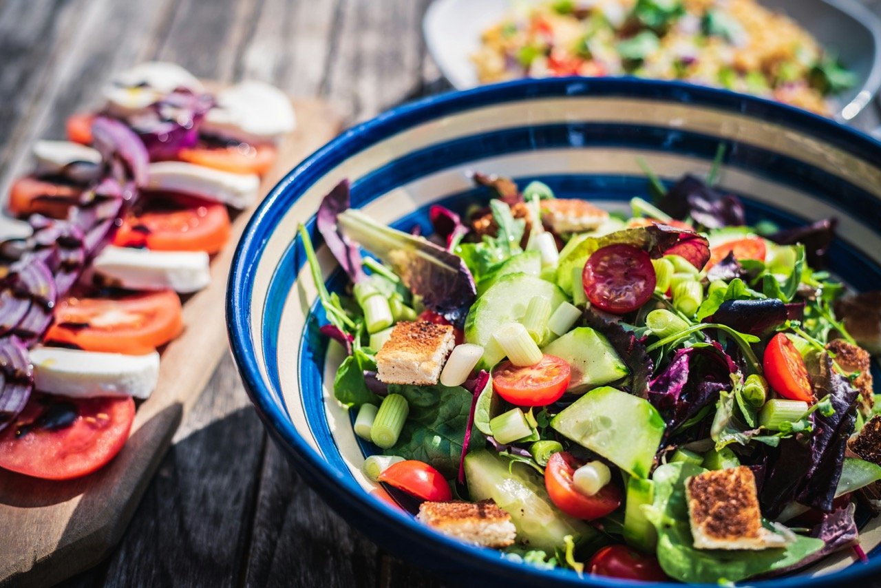 A vibrant spread of fresh salad and vegetables